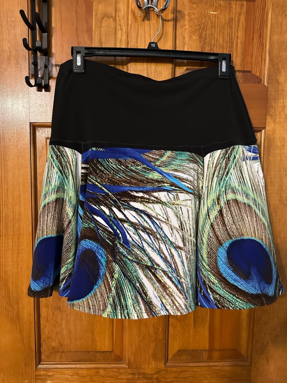 eva varro Black Waist Midi Skirt with Blue and Green Peacock Motif